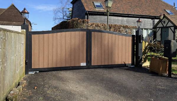 Arch-top steel and composite driveway gates by Portara Automation