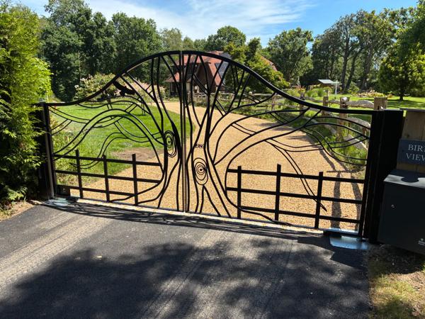Bespoke decorative metal gate with a tree‑like design