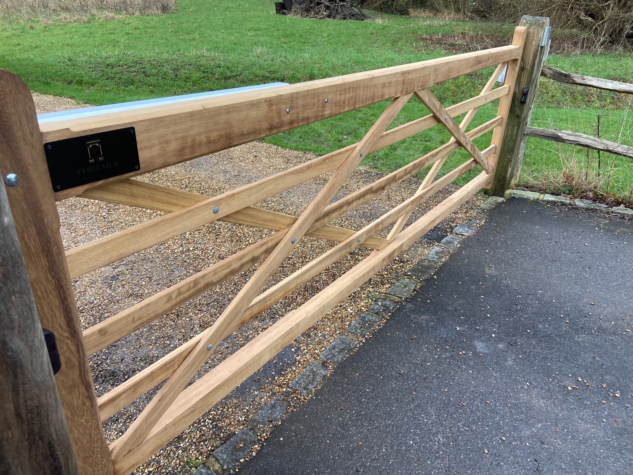 Five‑bar timber gate close‑up